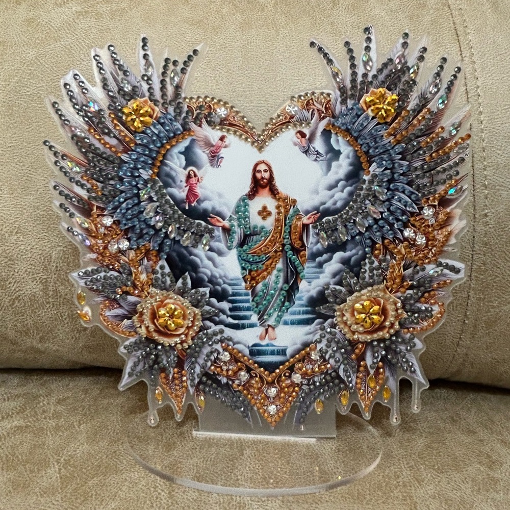 Gold and Silver Mixed Media Heart Art with Wing Design. smaller on a stand